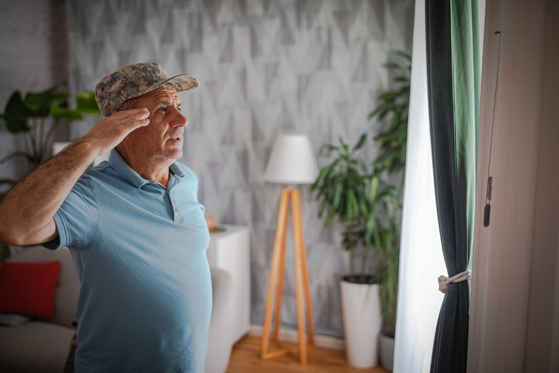 The equipment of a soldier who died in the war, the father is sad The equipment of a soldier who died in the war, the father is sad